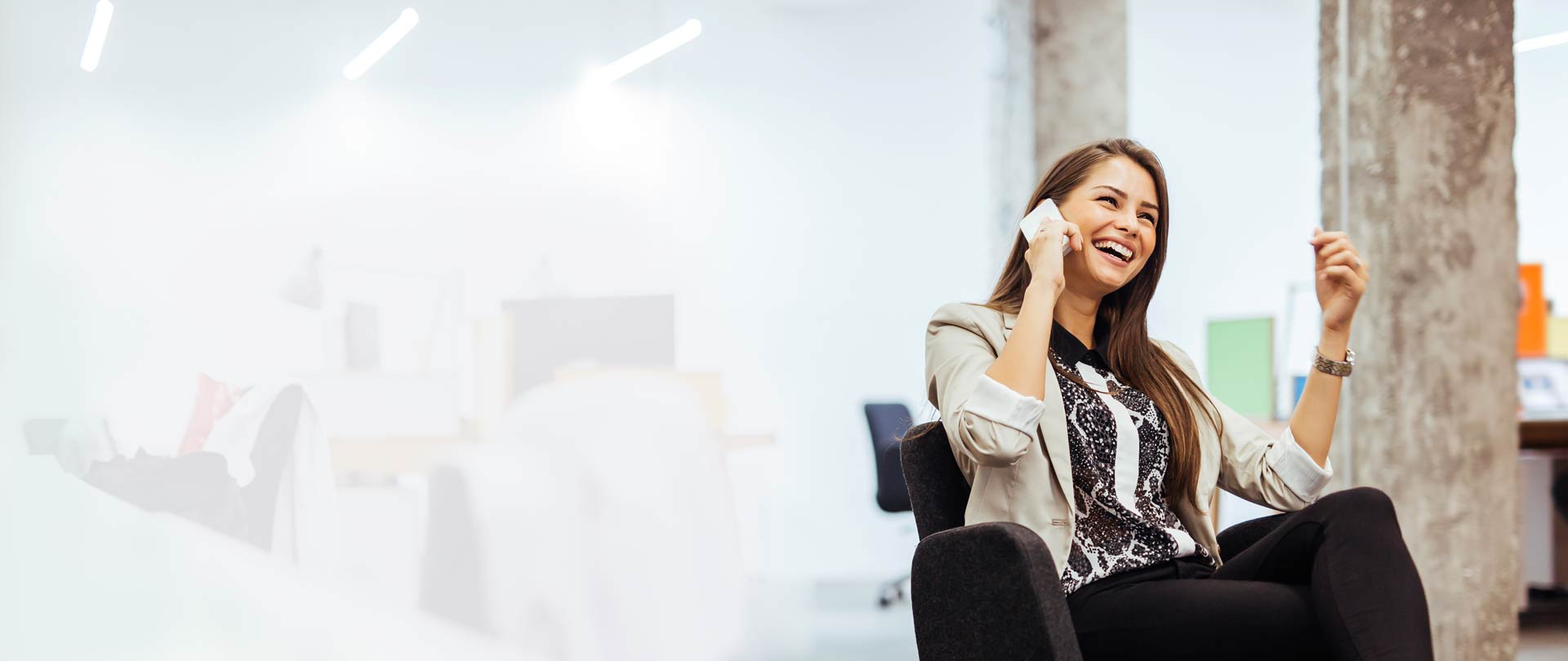 woman on mobile phone laughing